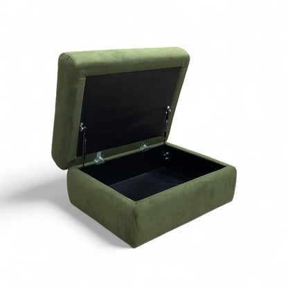 A view of the open footstool from above, showing the depth and capacity of the storage compartment.