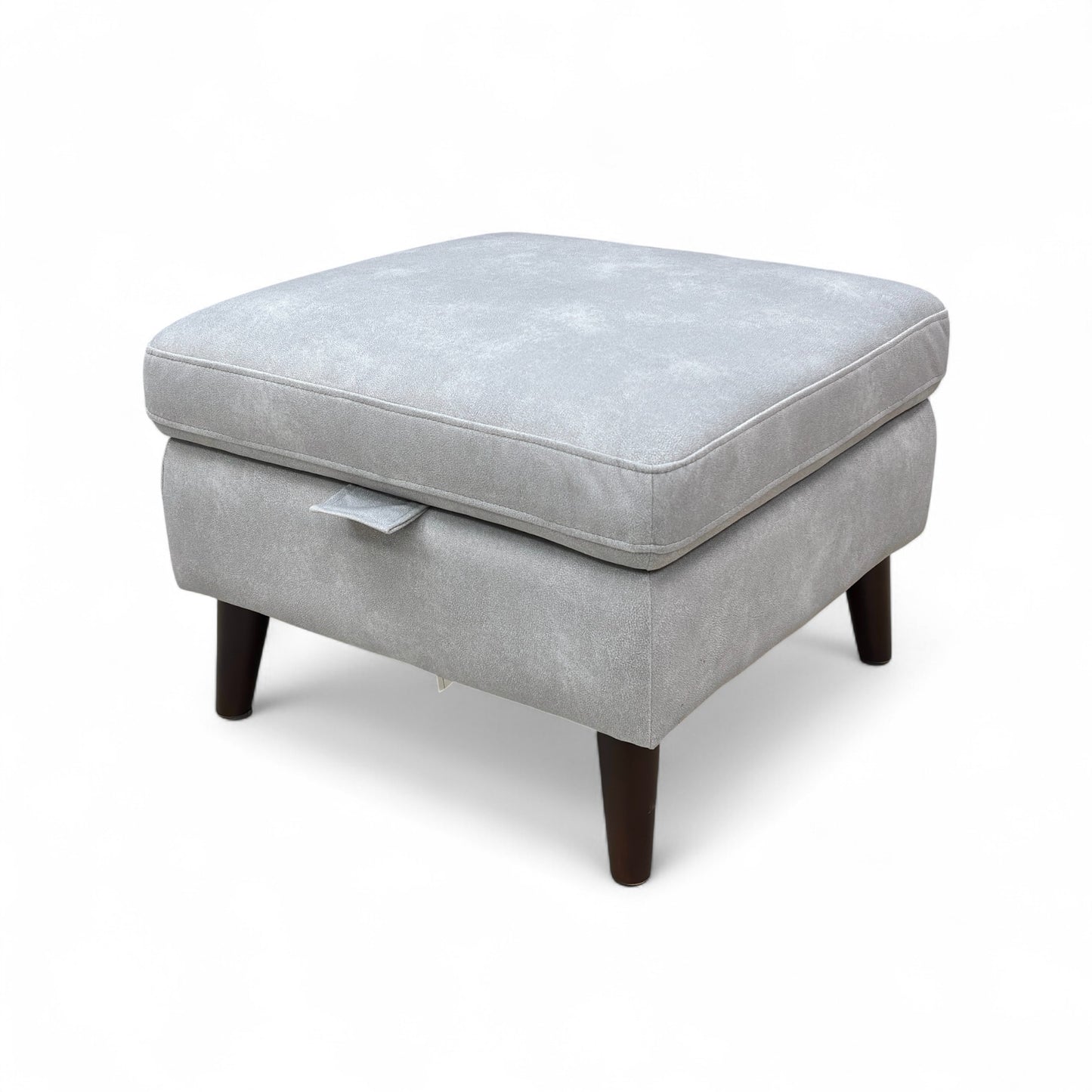 A shot of the footstool's base, clearly showing the removable metallic tapered legs.