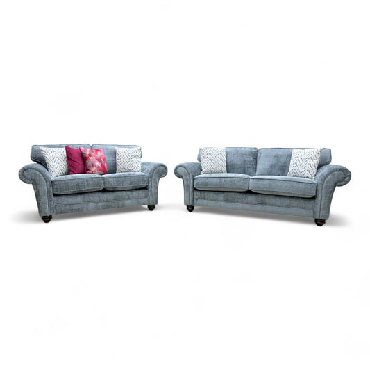 Full front view of the 'Clara' Bluish Grey Woven Fabric 3 + 2 Seater Sofa Set, showcasing both the 3-seater and 2-seater sofas in a room setting.