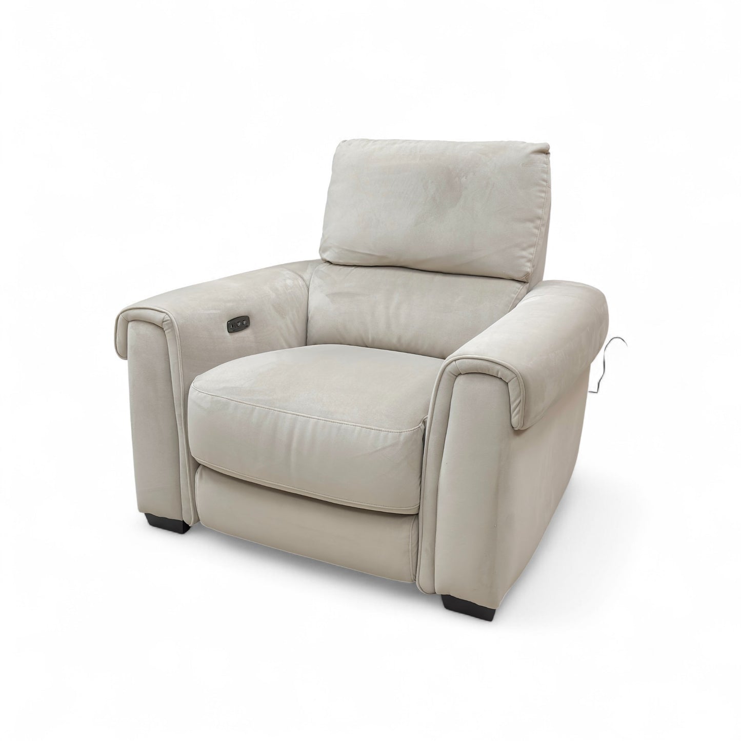 A view of the side of the armchair, emphasizing the width and arm design.