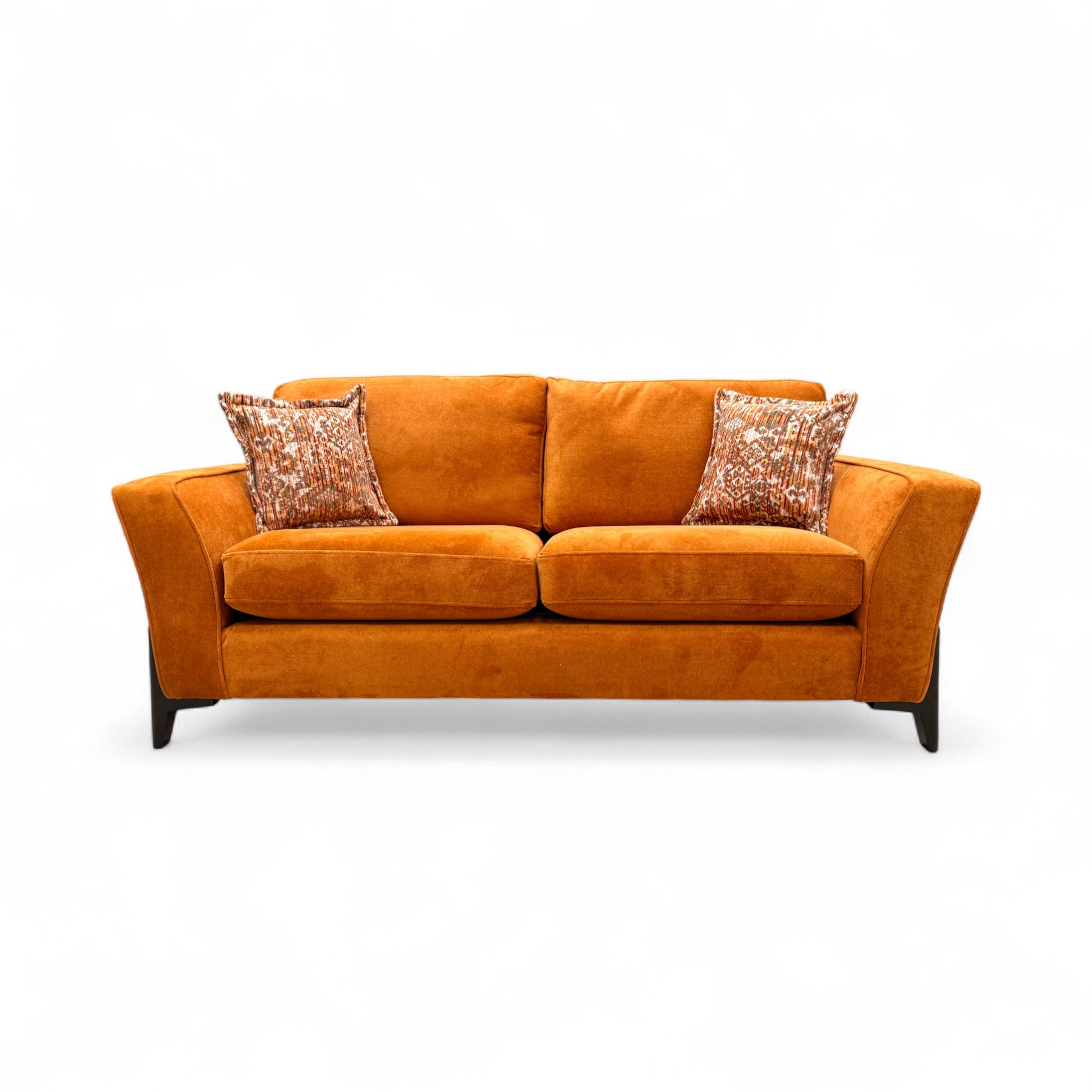 Front-on view of the plush 'Collins' Almond Orange Towel Velvet 3 Seater Sofa, emphasizing its solid color and contemporary design.