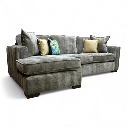 Side-view of the 'Chelsea' Left Hand Corner Chaise Sofa, showing the low-profile track arm and the wooden block feet.