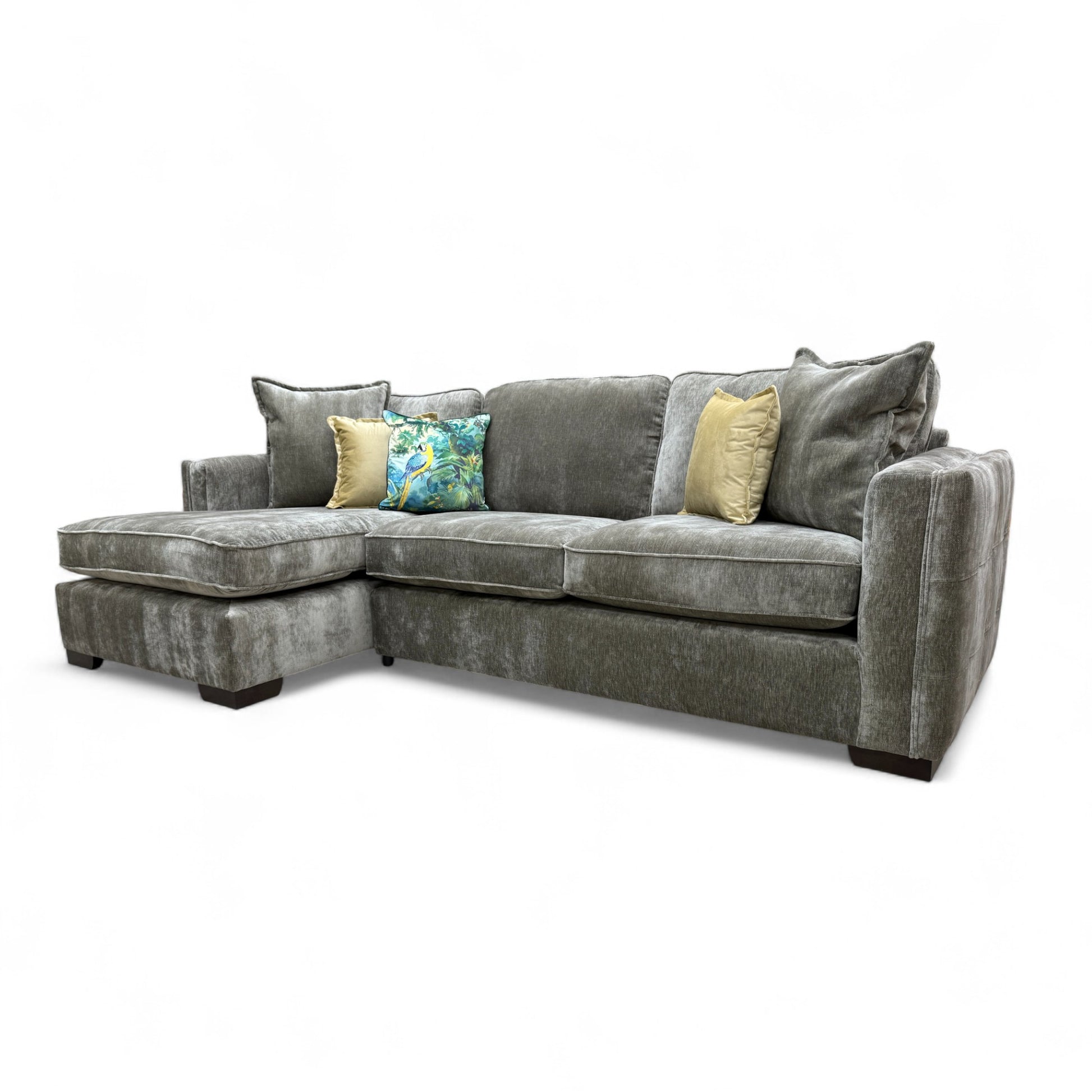 Angled view of the 'Chelsea' Left Hand Corner Chaise Sofa, highlighting the soft texture of the Derwent sage green fabric and the track arm style.