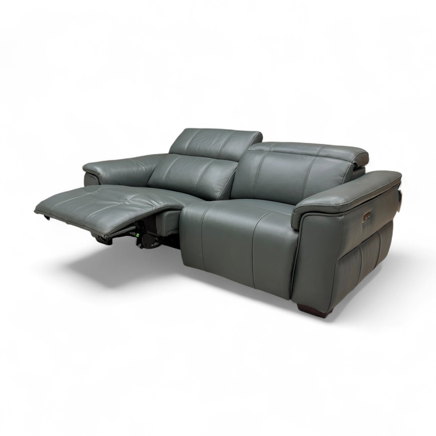 An image focusing on the stitching and tailoring details on the seat and back cushions.