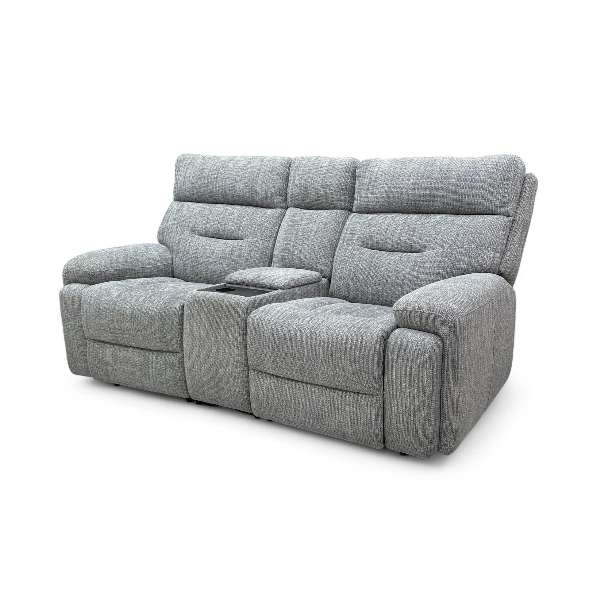 A side profile of the sofa, showing the sturdy, streamlined design and the profile of the seating.