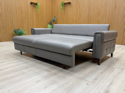Side view of the Zoom grey leather sofa, emphasizing its streamlined design and space-efficient profile.