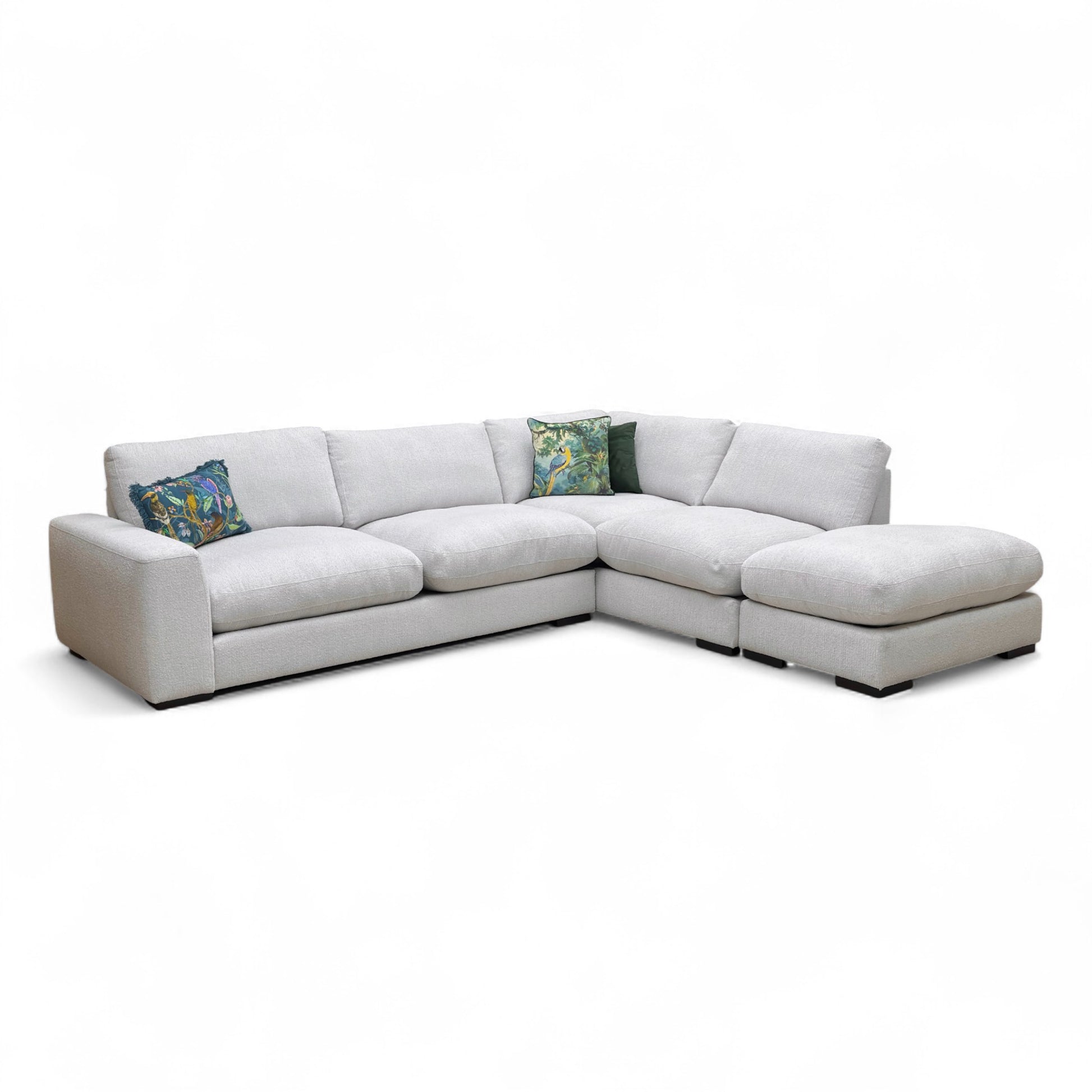 A view focusing on the seat cushions and the stitching detail, or an angle of the open chaise end.