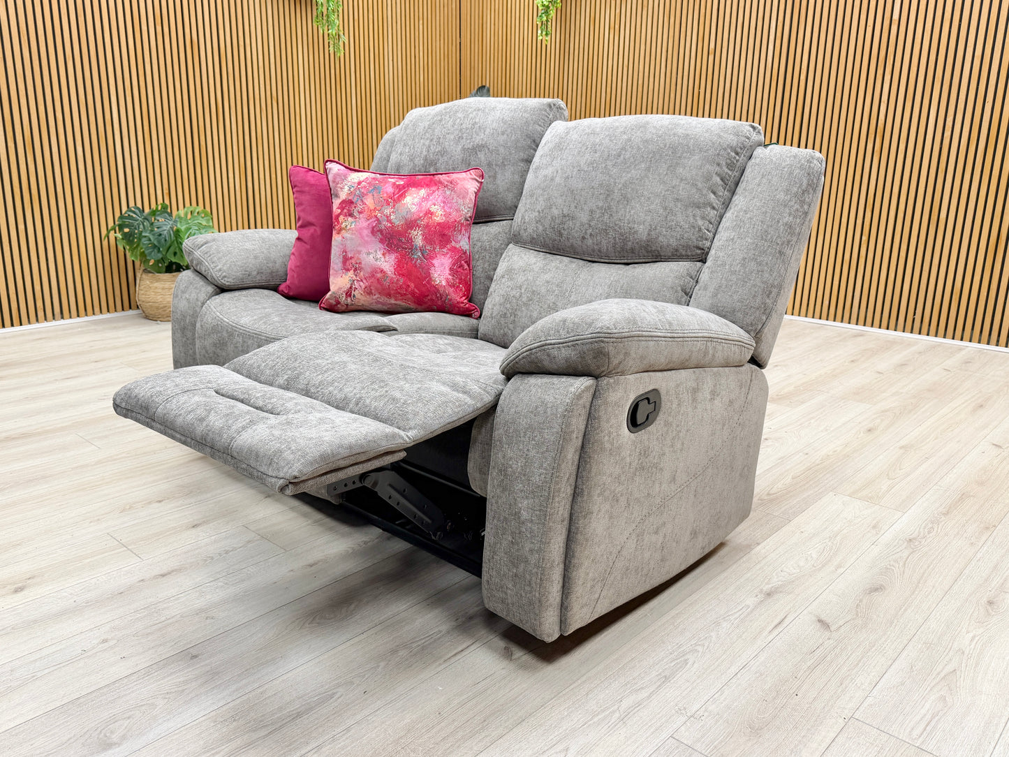 Lifestyle shot of the Weston 2-seater fabric sofa in a well-lit living room, showcasing its compact size and neutral mocha tone.