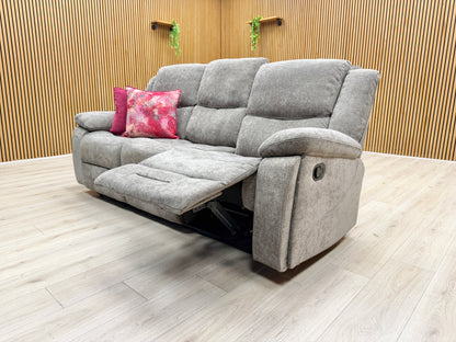 Lifestyle shot of the Weston mocha recliner in a modern living room setting, highlighting its generous seating area and cozy aesthetic.