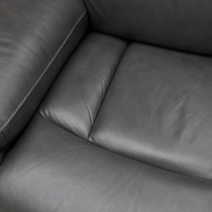 Close-up on the Starry Grey Leather upholstery, showing the texture and color.