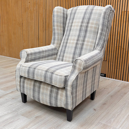 Lifestyle view for the Shirley large accent chair, highlighting the durable checkered Winchester fabric, premium seat cushioning, and timeless traditional design.