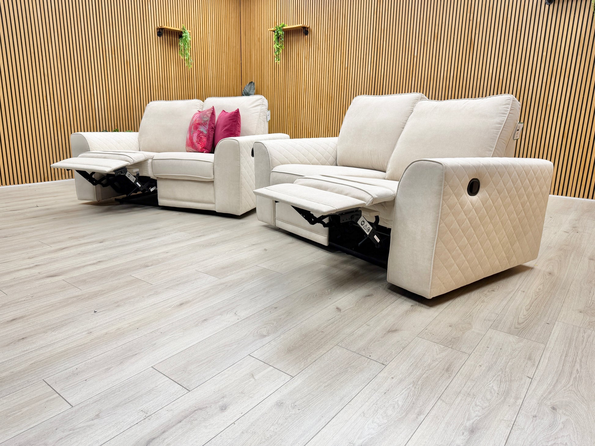 One of the ‘Orka’ 2-seater sofas with both manual recliners extended, demonstrating a comfortable lounging position.