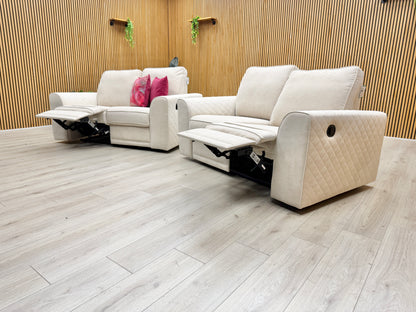 One of the ‘Orka’ 2-seater sofas with both manual recliners extended, demonstrating a comfortable lounging position.