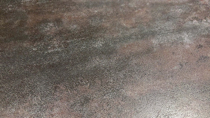 Textured brown surface of a dining table with a gradient effect