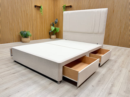 Life style view of the complete king-size bed set, showing the clean lines of the divan base and the tall, sturdy headboard