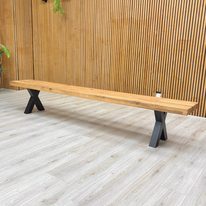 Angled view of the bench, focusing on the leg structure.