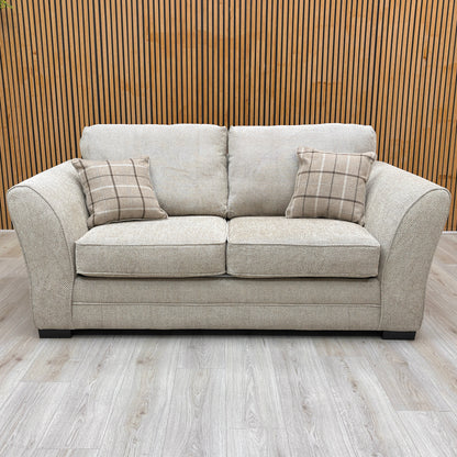 Fully upholstered front view of the Sophie Sultan sofa bed in oatmeal woven fabric, suitable for open-plan placement.