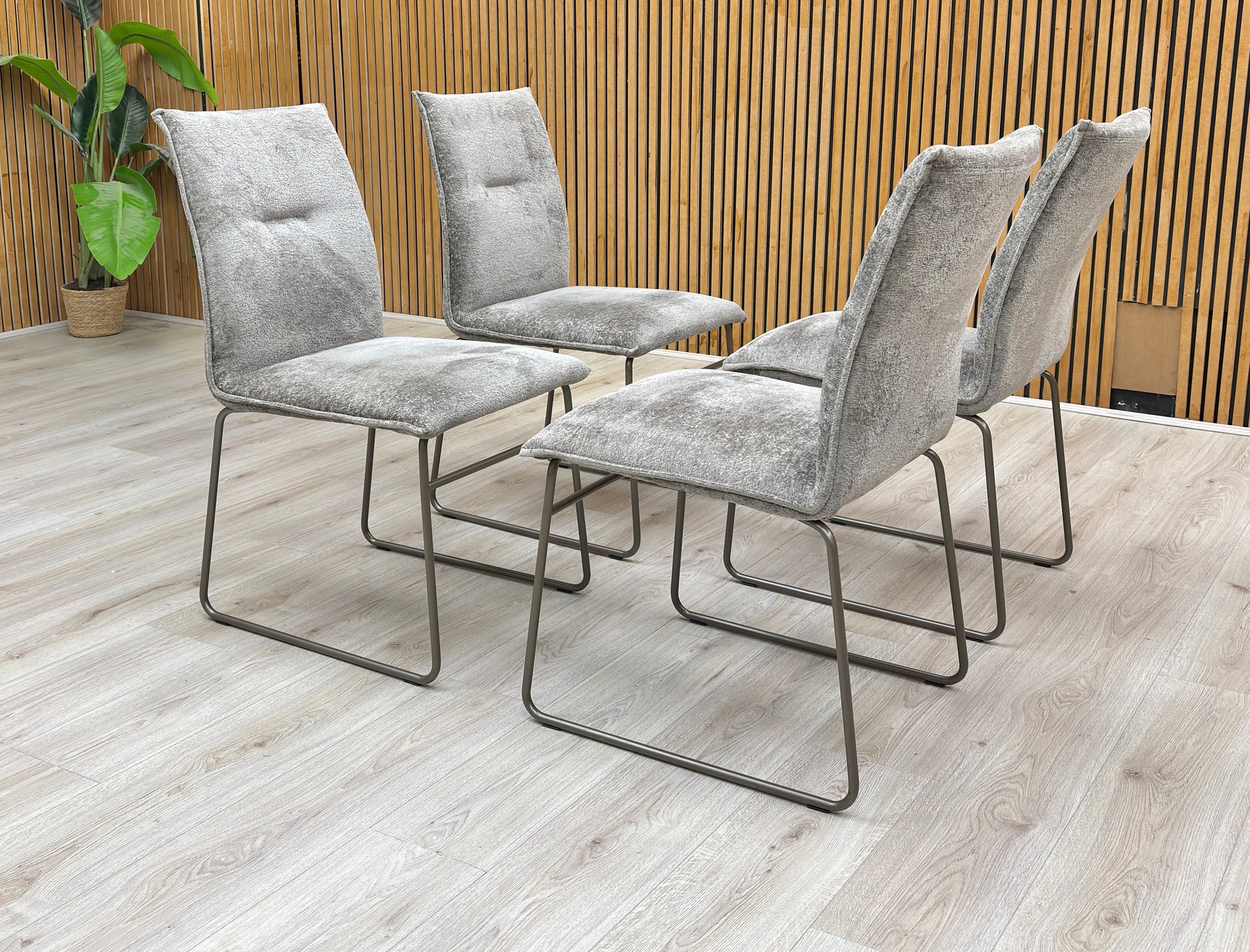 Lifestyle view of the Connubia 'Maya' dining chair set brings sophisticated Italian design and contemporary comfort to any dining space.