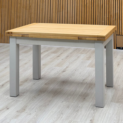 ‘Lewis’ Solid Oak 120cm Large Draw Leaf Extending Dining Table with Dark Grey Faux Leather Roll Back Dining Chairs – view 3