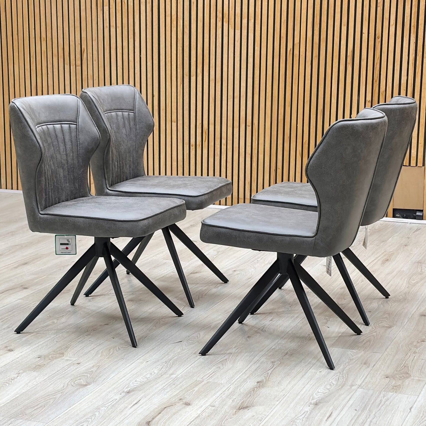 ‘Aydin’ Dark Grey Faux Leather Set of 4 Swivel Dining Chairs