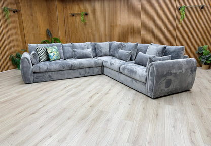 Lifestyle shot of the 'Alarna' sofa in a modern room setting.