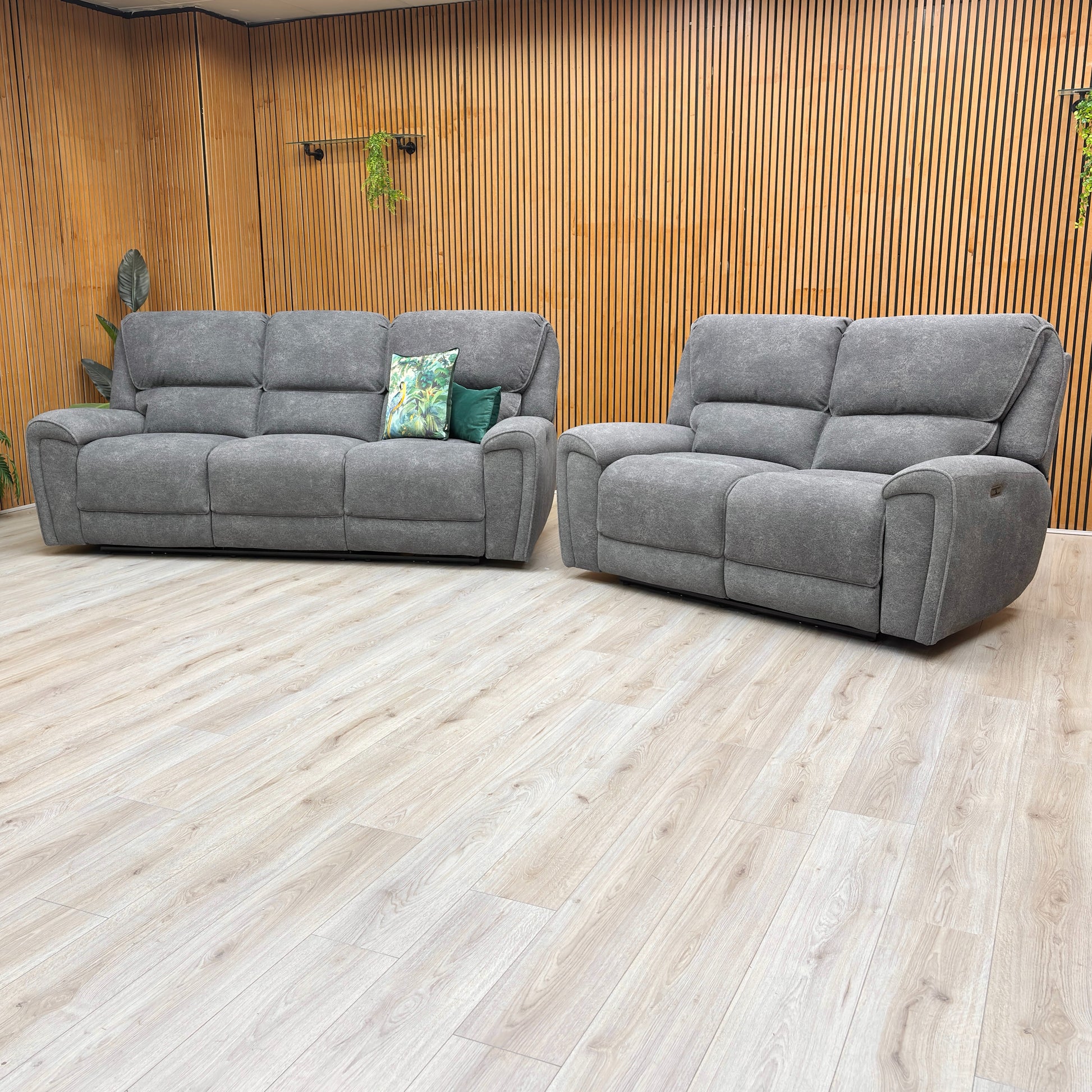 The 'Ricky' Power Recliner Sofa with the footrest extended, demonstrating the electric reclining function.