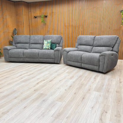 The 'Ricky' Power Recliner Sofa with the footrest extended, demonstrating the electric reclining function.