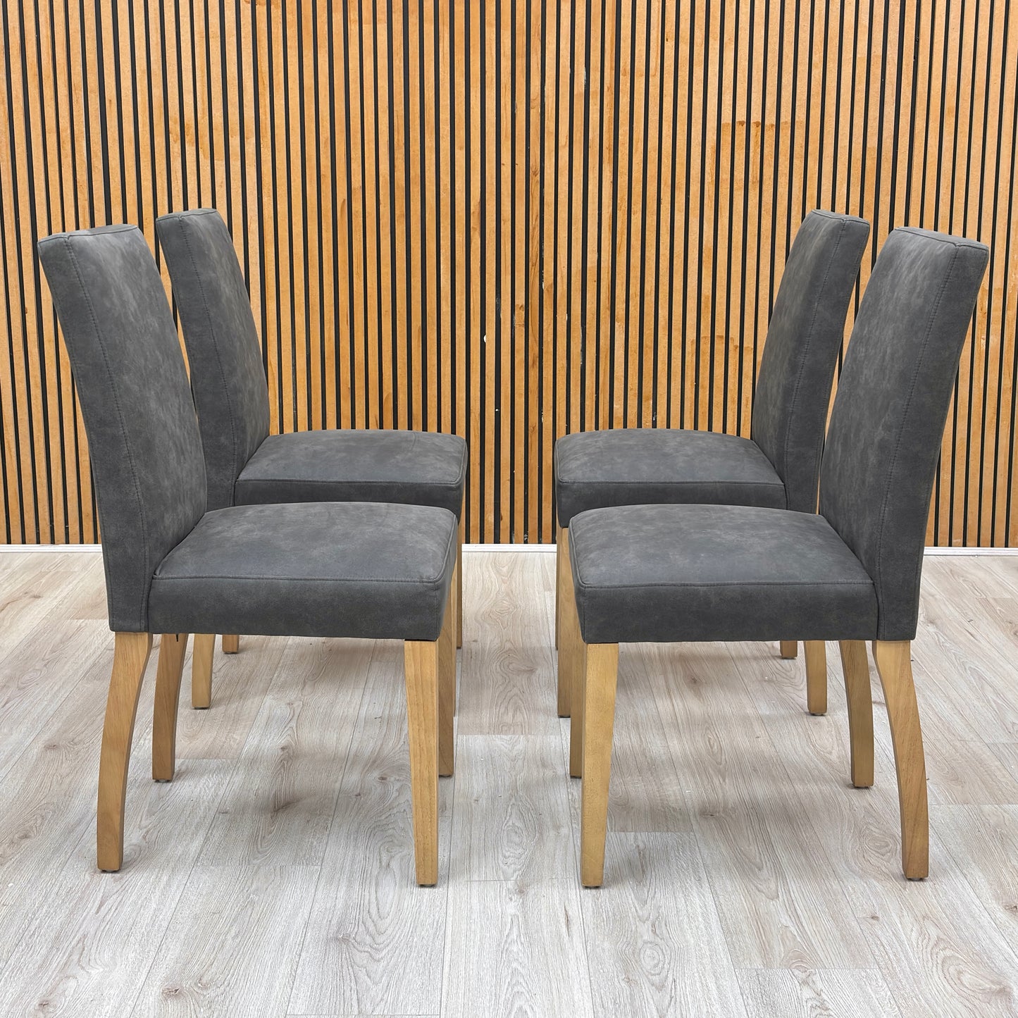 Lifestyle view  of the Augusta chair set, emphasizing the clean lines and solid construction suitable for daily family use.