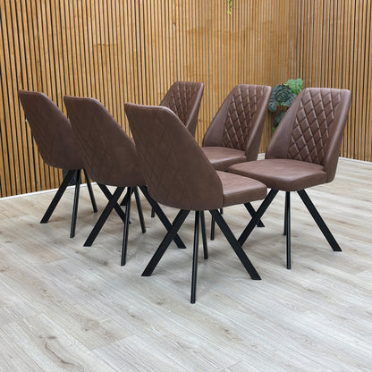 Lifestyle view of the Jupiter tan brown swivel chair, showcasing the stylish curved silhouette and elegant quilted-effect stitching.
