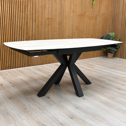 ‘Raul’ Travertine Ceramic Top 120cm Swivel Extending Dining Table with Stone Grey Fabric Set of 4 Swivel Dining Chairs