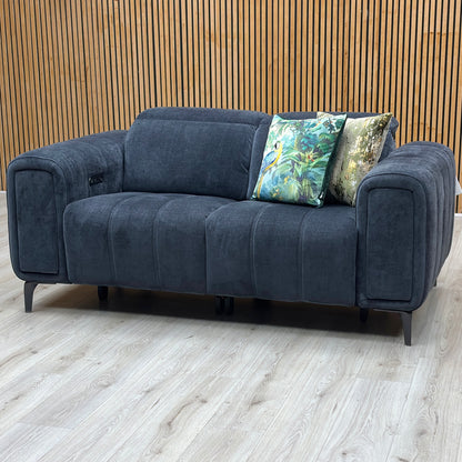 ‘Elphaba’ Manhattan Indigo 58009 Fabric 2 Seater Power Recliner Sofa with Storage Arms Furniture Village