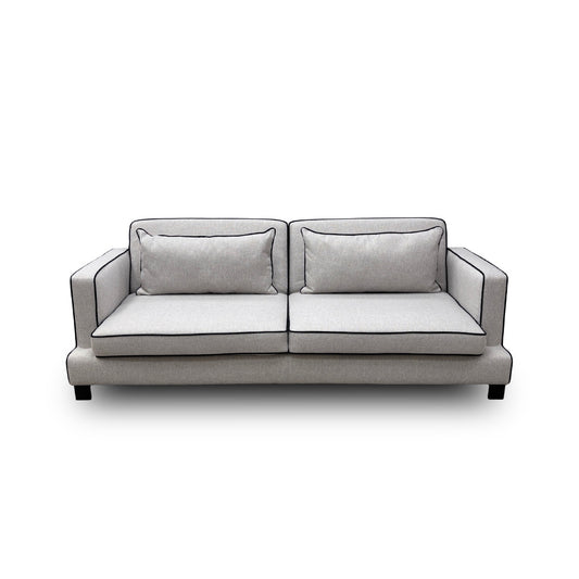 The 'Demure' 4 Seater Sofa Bed fully converted into its sleeping position, revealing the hidden mattress.