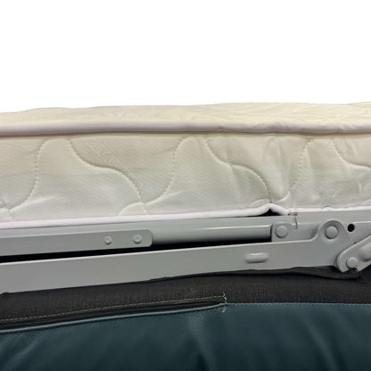 Mattress with a metal support structure on a white background
