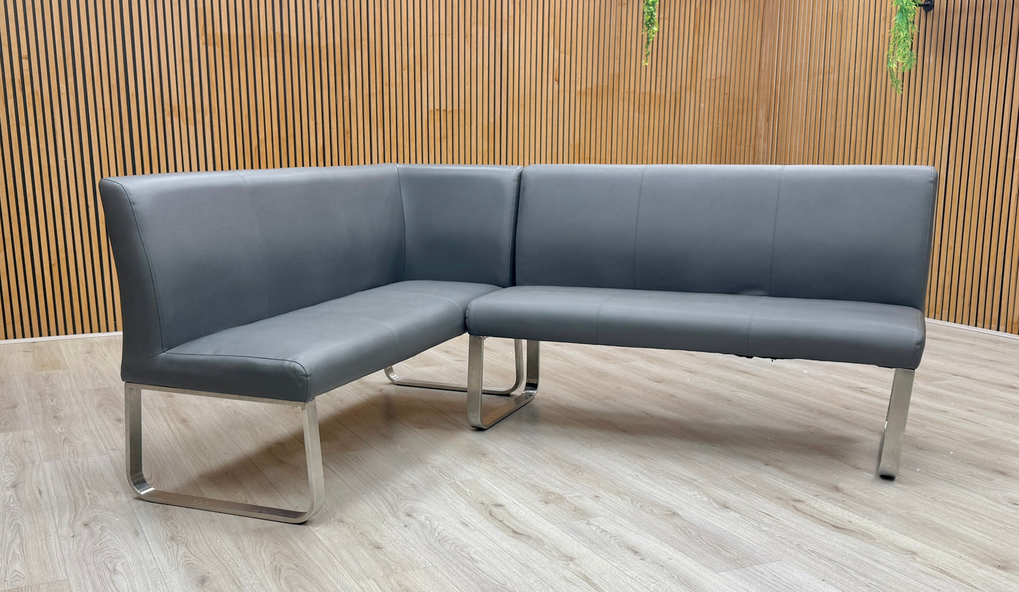 Lifestyle view of Cocoon corner bench styled in a contemporary dining or lounge area, maximizing seating capacity in a corner layout.