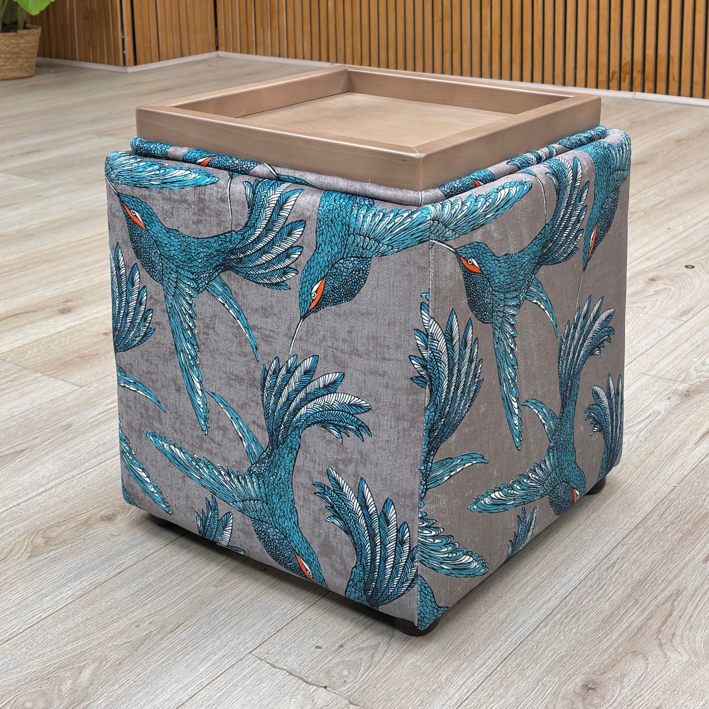 View of the internal storage compartment with the lid removed, showing the spacious interior for household storage.