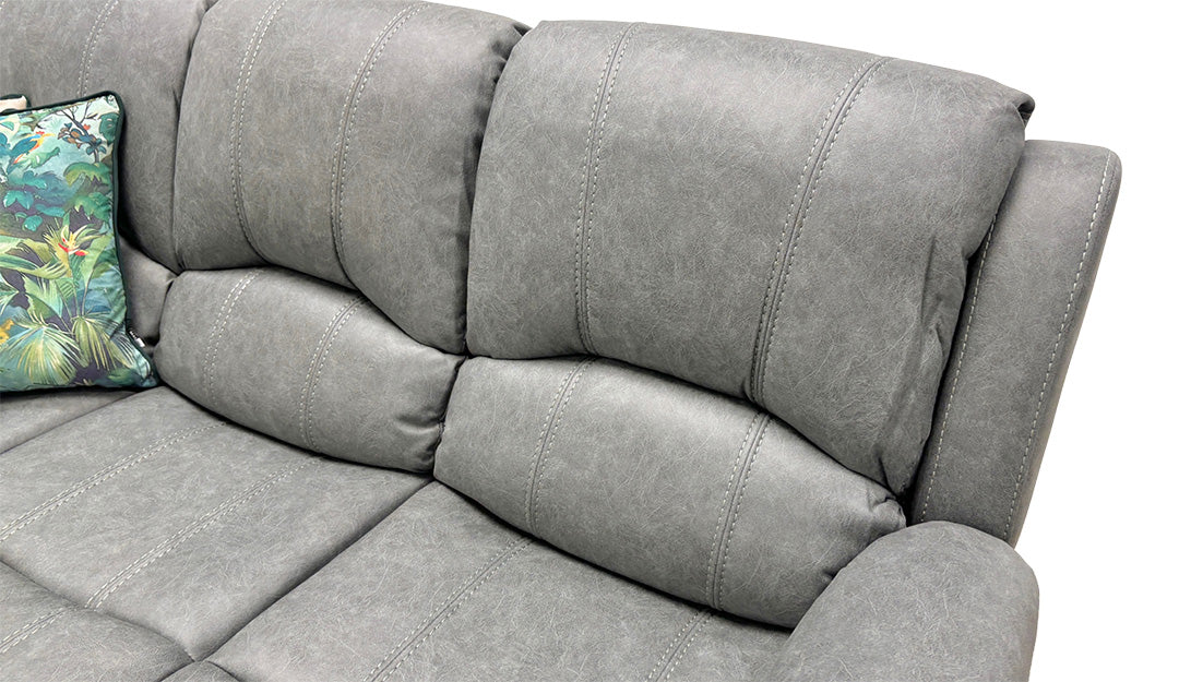Detailed close-up of the resilient Grey Endurance Fabric upholstery, showcasing the texture, durable stitching, and the material's stain-resistant quality.