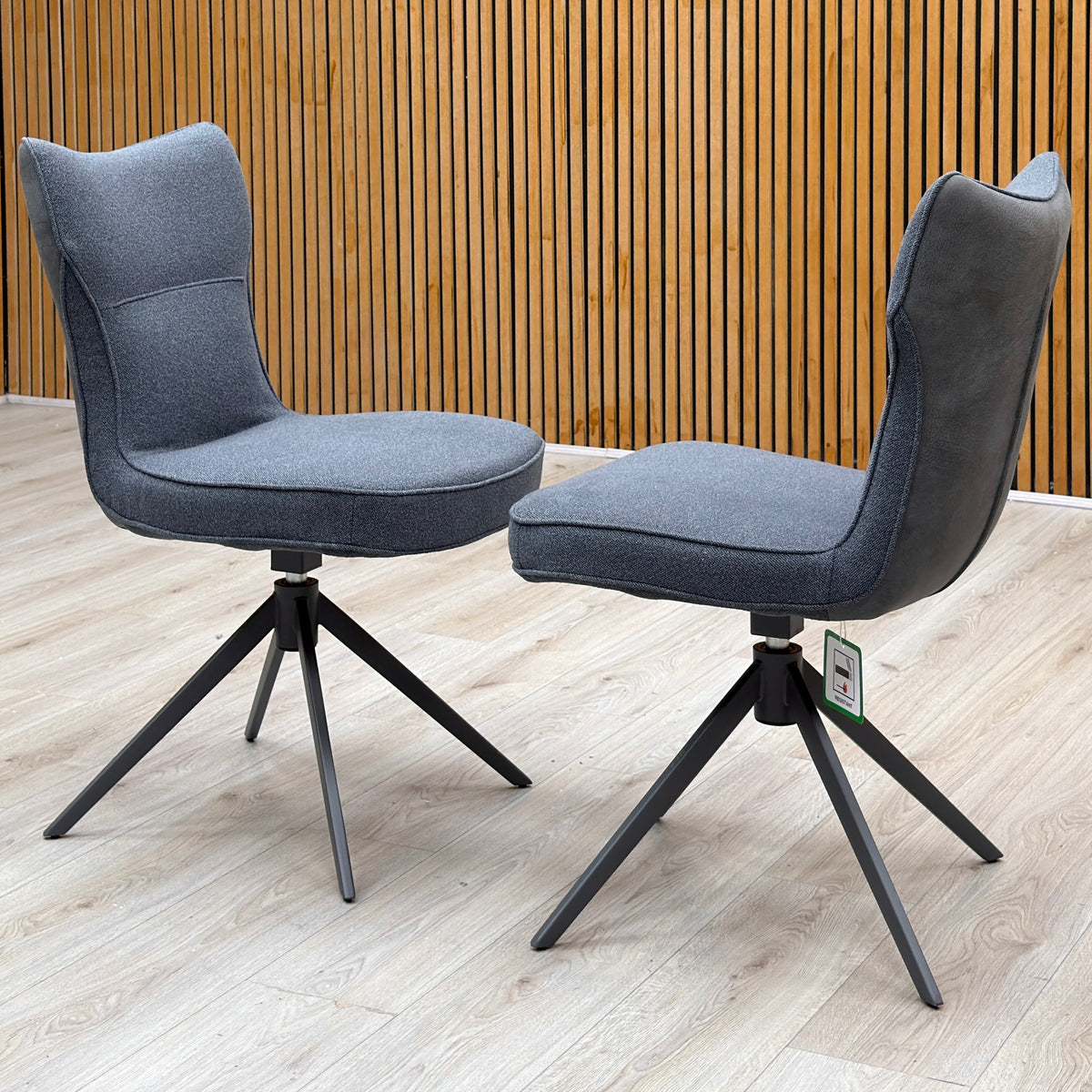 ‘Carrera' Dark Grey Fabric Pair of Swivel Dining Chairs