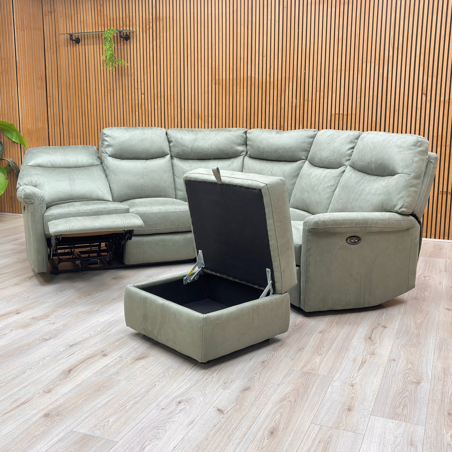 Lifestyle shot of the Olive fabric corner sofa set in a bright living room environment.