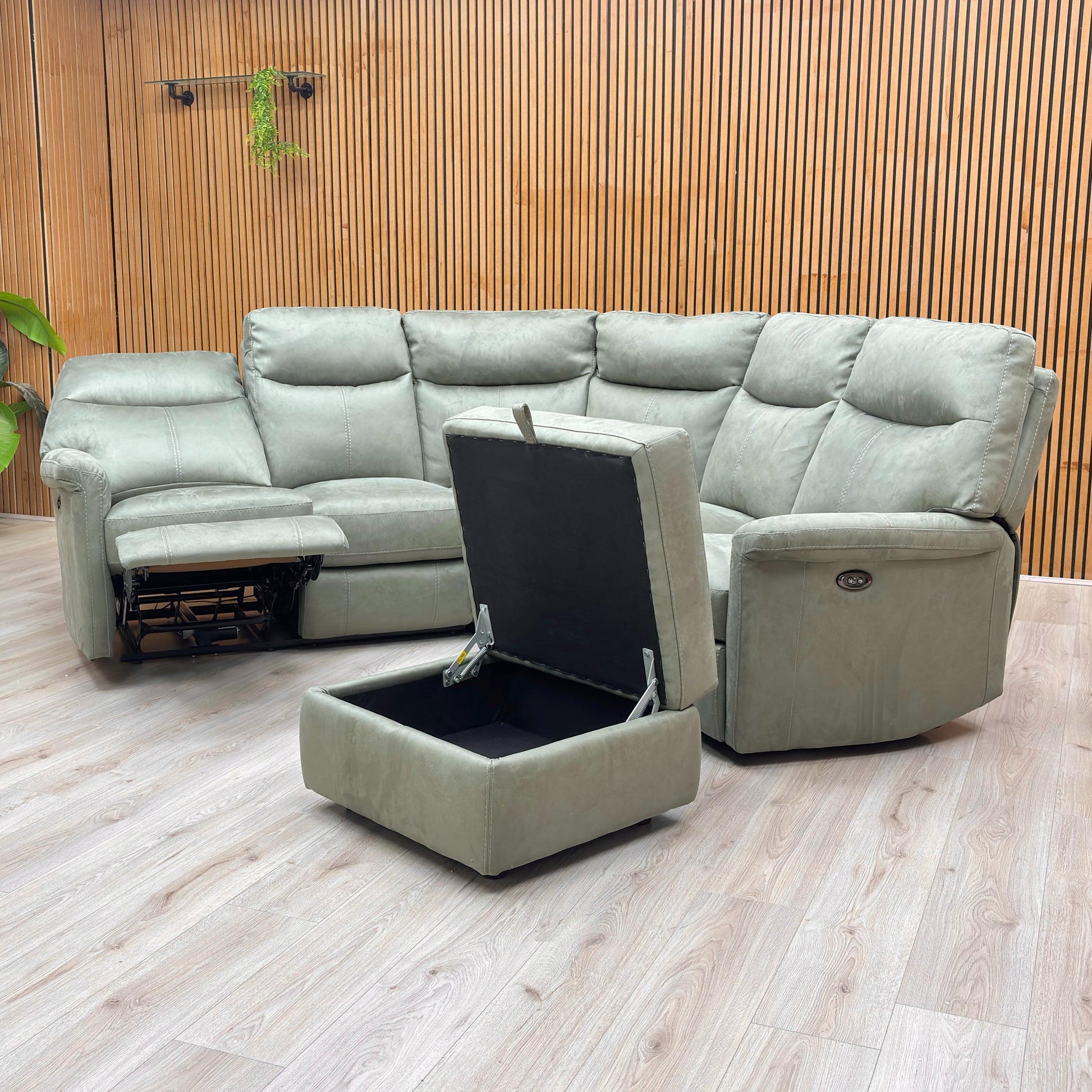 Lifestyle shot of the Olive fabric corner sofa set in a bright living room environment.