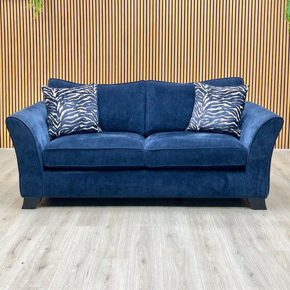 Front-facing wide studio view of the complete Sasha Zara Navy Blue sofa set arranged together, highlighting the classic back design, deep plush cushions, and uniform tailored lines across both matching units.