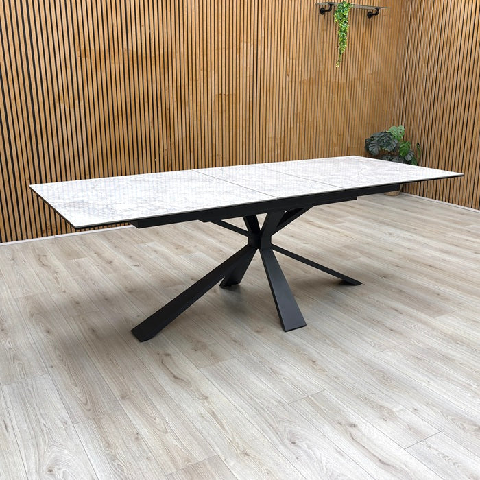 Detail view of the high-gloss grey ceramic top surface, illustrating the heatproof, scratch-resistant, and chip-resistant laminated finish.