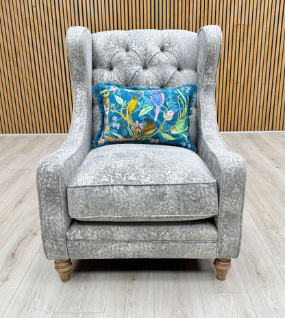 Front view of the Blenheim 'Savoy' winged accent chair upholstered in silver fabric, featuring a high back with traditional side wings.