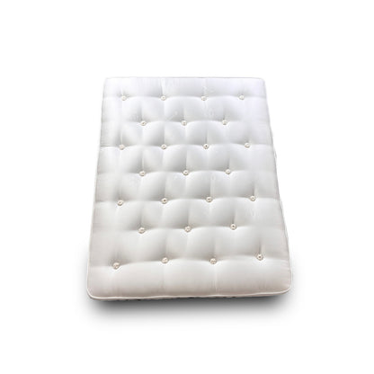 King size Highgrove Oakley Ortho 1000 pocket sprung mattress, showing the firm, tufted surface and side border detail.