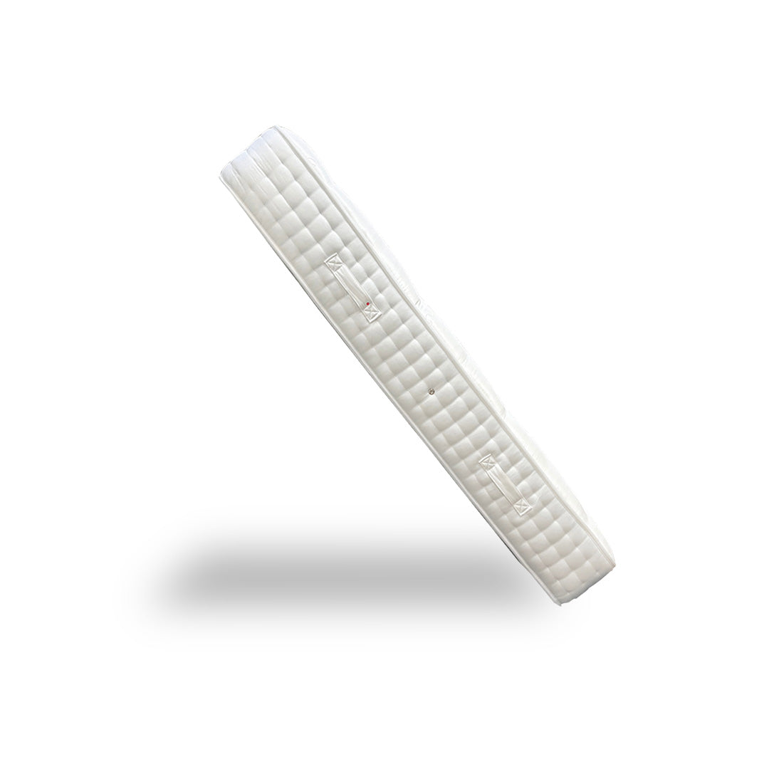 Detail shot of the mattress side border, showing the firm edge support and any stitching or handles (if visible).