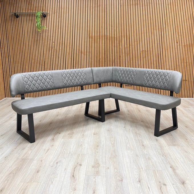 Lifestyle view of the Venus corner bench arrangement in a stylized modern dining room setting.