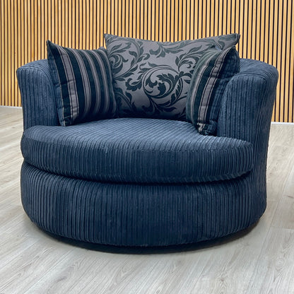 ‘Celine' Black Celine Cord Fabric Large Swivel Chair DFS