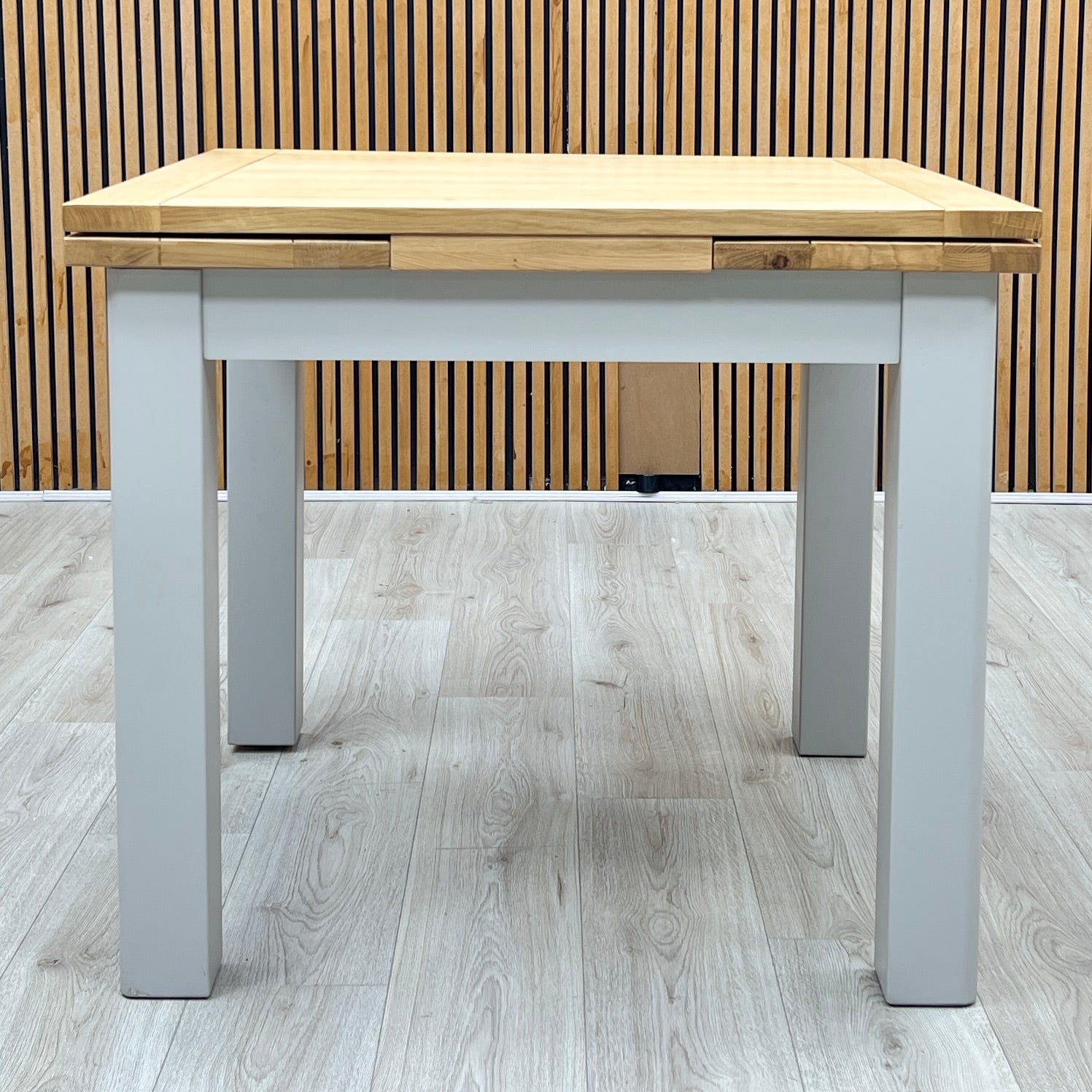 ‘Hamilton’ Solid American Oak Draw Leaf Extending Dining Table with Charcoal Grey Fabric Dining Chairs - Set of 4 Furniture Village