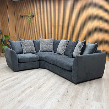 Lifestyle view of the Havana corner sofa, showcasing its expansive seating layout, deep chaise longue extension, and welcoming, contemporary design.