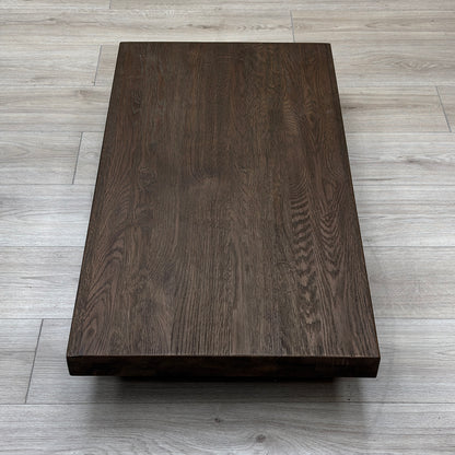 Mars dark oak solid oak extension leaf lying on a light wood floor