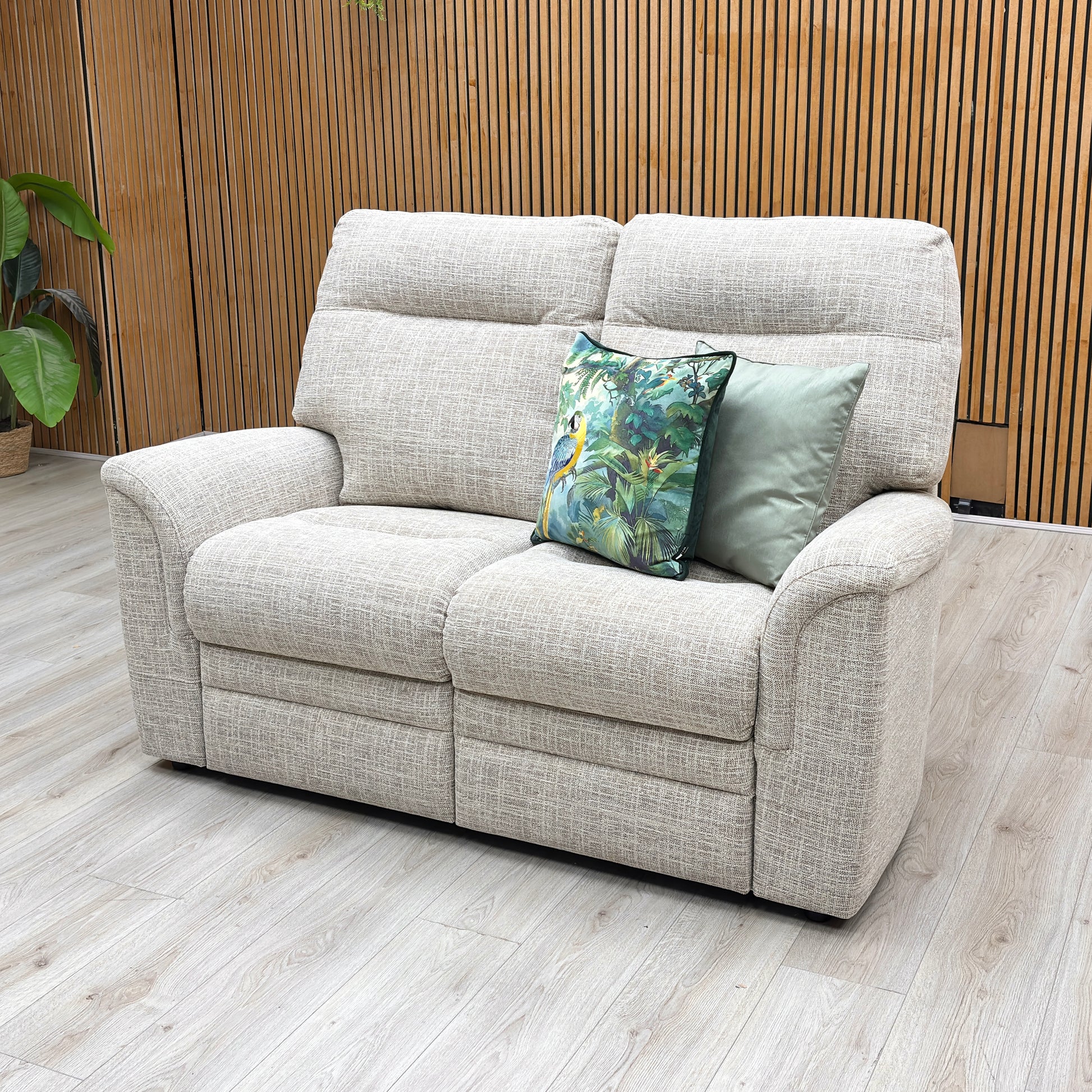 Lifestyle view of the ‘Hudson’ 2-seater sofa, emphasizing the plush lumbar support, deeply padded seat cushions, and inviting, comfortable silhouette.
